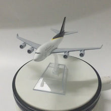 Load and play video in Gallery viewer, UPS Courier Cargo Boeing 747 Airplane 16cm Diecast Plane Model
